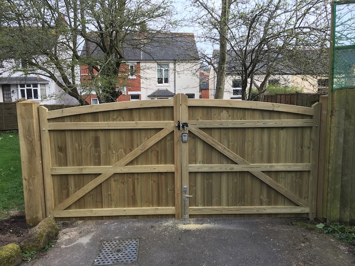 double gate on driveway with curved top